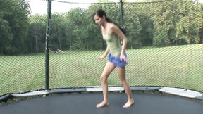 Skinny brunette Tamara Jade masturbated on trampoline