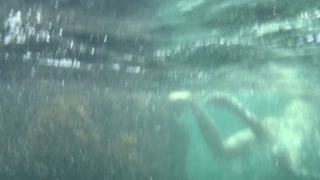 watching my naked girlfriend underwater in the sea