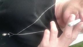 Smoking cigarette in black pantyhose outside make hole for my clit and turn off cigaret by my Pee