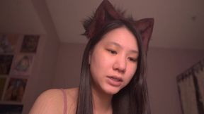 Cute Asian Kitty Cat Girl reads Bible story