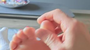 Playfully cheeky little feet