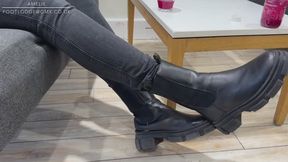 Shoeplay in chunky black boots