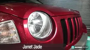 Janet Jade uses her big tits to wash a car