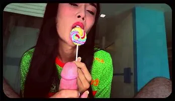 Sweet Lollipop Pleasure: Thai Ladyboy's Intimate Blowjob