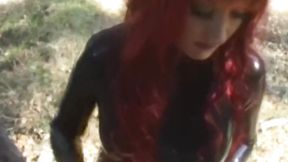 Latex babes Aradia and Krissy engage in lesbian BDSM outdoor