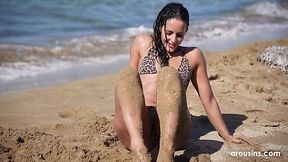 Cute brunette sucks guy's dick and receives facial near the ocean