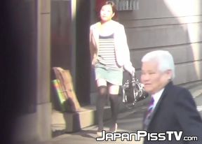 Kinky private cam records random Japanese girls while peeing in the public toilet