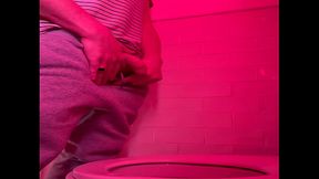 Amateur guy pissing in the toilets of a bar