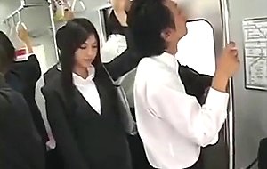 Japanese Slut Jerks off Businessman on Subway