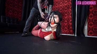 Vampirella Struggles to Escape Hogtie