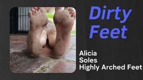 Beautiful feet with very dirty, muddy soles (2)