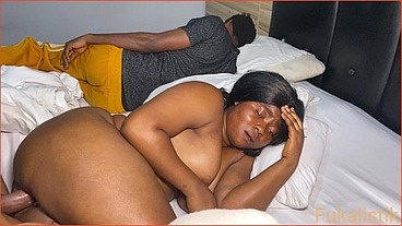 Cheating housewife fucks next door neighbor while in bed with husband