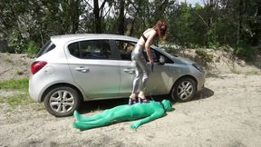 Suited slave gets punished outdoor from femdom chick