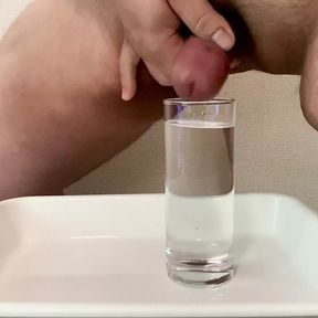 Small Penis Cumming And Pissing In A Glass Of Water