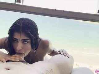BitchSelena - Brunette hair with a large ass drilling her anal opening on the beach