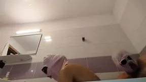 Amateur couple gets steamy in bathtub with busty, hairy MILF