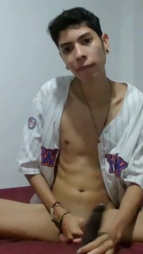 Jerking my bick twink cock while sucking a black dildo until I cum.   Clip 1