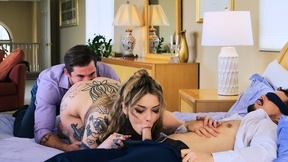 Lavishly tattooed slut gets double penetrated in bed