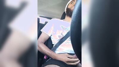 Rock Mercury plays with his big dick inside the car