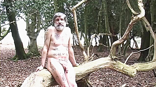 Bearded Father Unclothes Outdoors