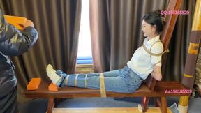Bound Brunette in Eastern Ecstasy