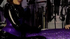 Playing with a vibrator in latex outfits