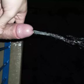 Peeing from the balcony while it rains. Dick german dick pissing outdoor.