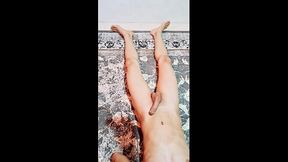 Dominant partner humiliates submissive's feet in intense foot worship session
