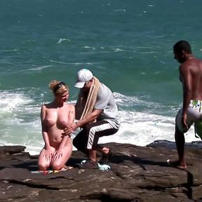 Busty blonde invites strangers to stuff her hard by the sea