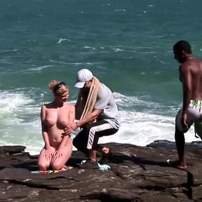 Busty blonde invites strangers to stuff her hard by the sea