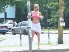 Act of public nudity of my well stacked blonde wife over the bus stop