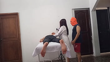The masseuse is giving a massage to her client and then her boyfriend arrives to fuck her at work during customer service.