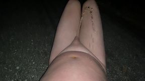 naked self-piss on a walking path in the public park at night