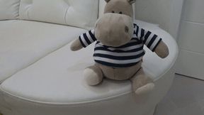 A plush toy on my crossed legs d