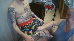 I'm sitting on a stool, a fat woman jerks off my cock