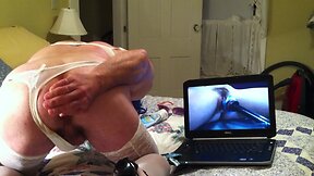 Nasty crossdresser dildoing himself furiously