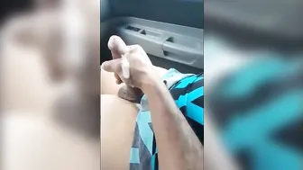 Amateur crossdresser strokes his big cock and cums in the van