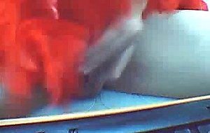 Ts in red on webcam