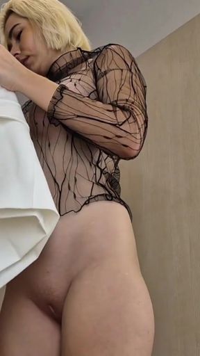 Captivating moment from &quot;NO BRA Try on haul. View from below in the locker room on a blonde with big tits&quot;