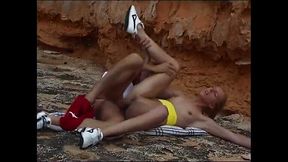 Petite slut's wet pussy gets pounded on the sandy beach by a veteran