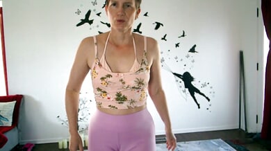 MILF bends deep into yoga pose showing off her big ass and shaved pussy