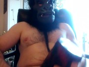 Gorilla masked man uses bad dragon mouth and cums on it.