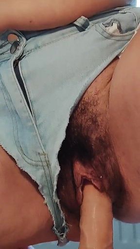 Blonde Stuffs Her Hairy, Big Pussy with Her Dildo