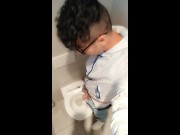 Twink with fat uncut cock piss at a rest stop toilet