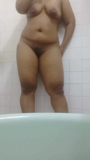 Chubby maid shoots shower video for her lover
