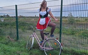 Brazen Piss Action in a Dirndl!!! Pissed All Over a Stranger's Bike!