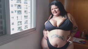 BBW in the Window Smoking and Showing Off My Big Breasts