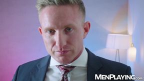 Blond suited hunk Magnus Loki tugs his cock until it explodes