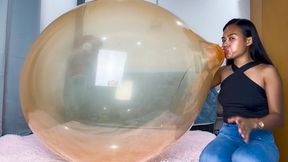 Sexy Camylle Blows To Pop Huge Orange 24 Inch Belbal Crystal Balloon