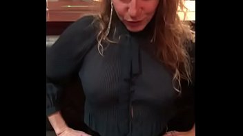 Naughty MILF flashes her panties in a crowded restaurant